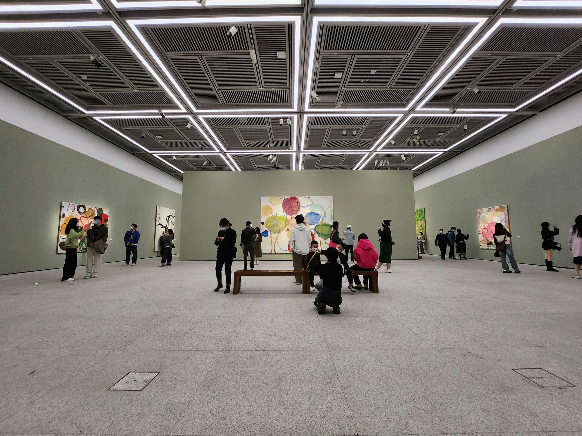 person wearing grey knit sweater