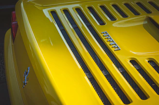 Side profile of a classic Ferrari 458 Italia with highlighted parts ready for upgrade.