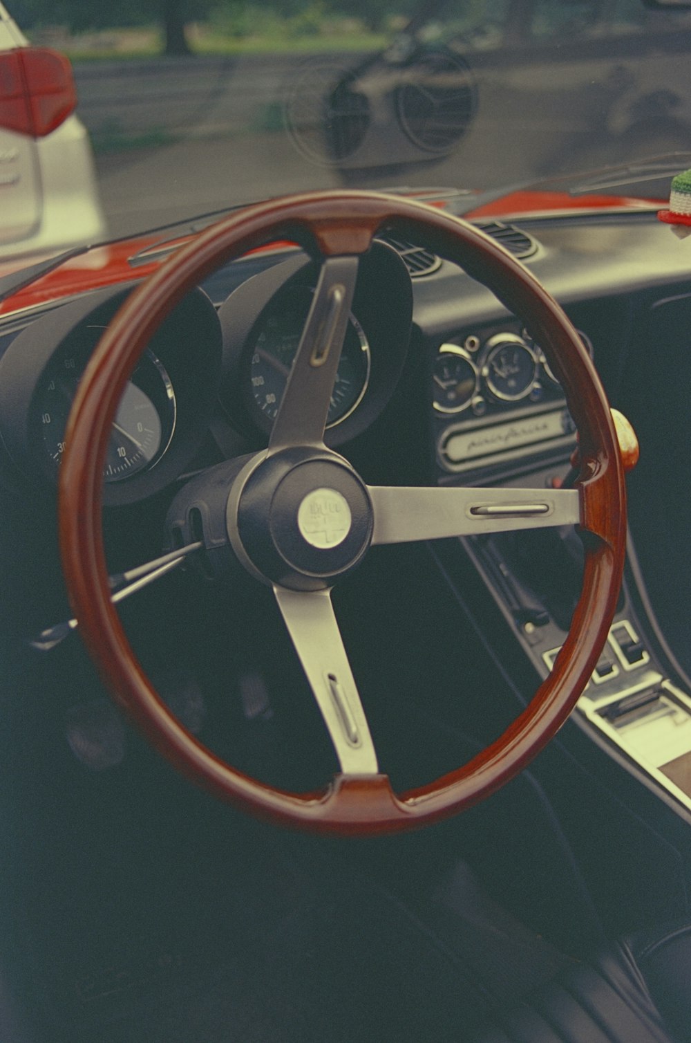 a steering wheel and dashboard of a car