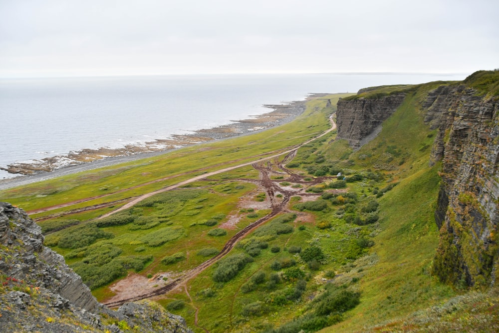 a scenic view of the ocean from a cliff