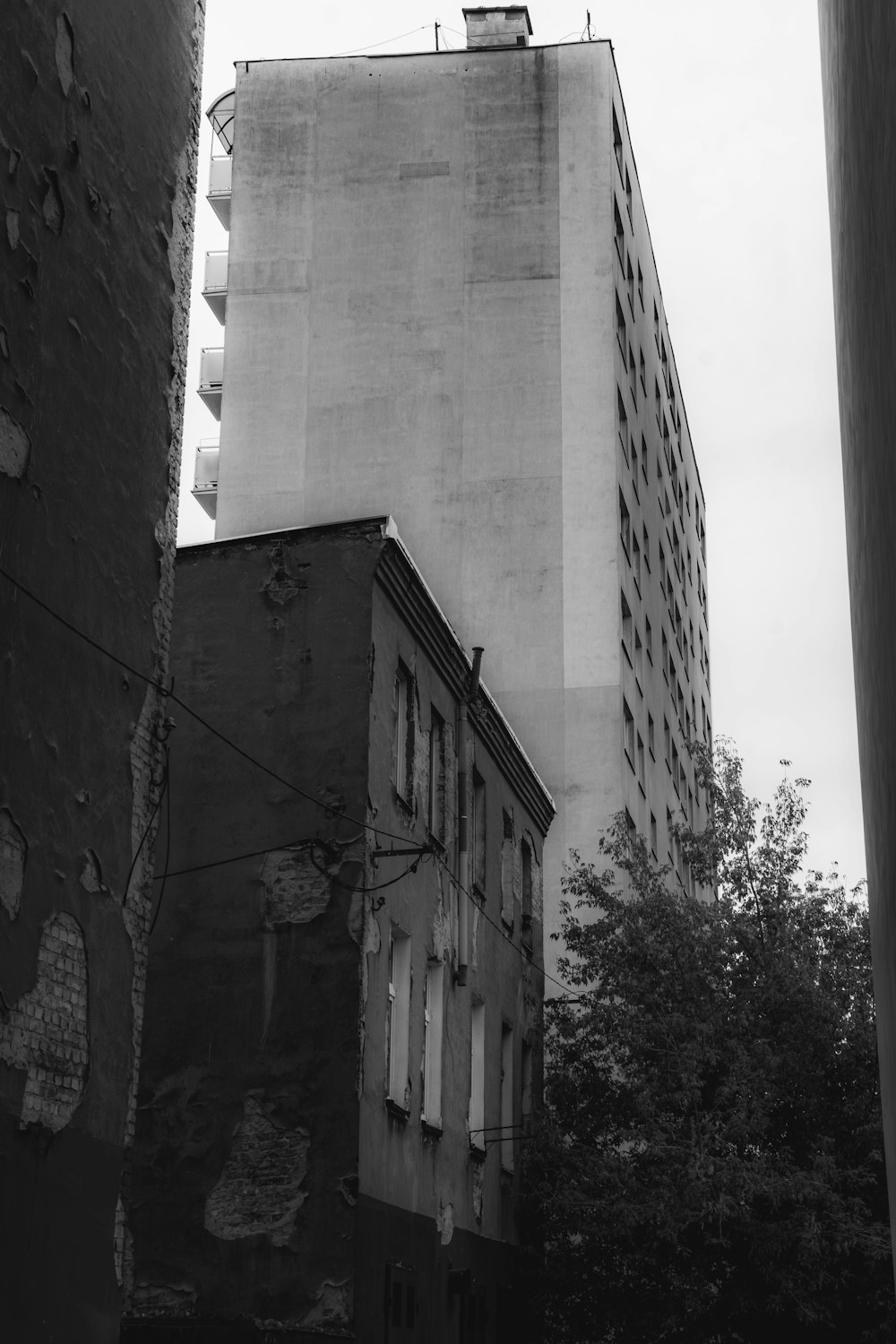 a black and white photo of a tall building