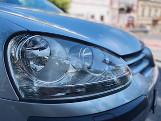 a close up of the headlights of a car
