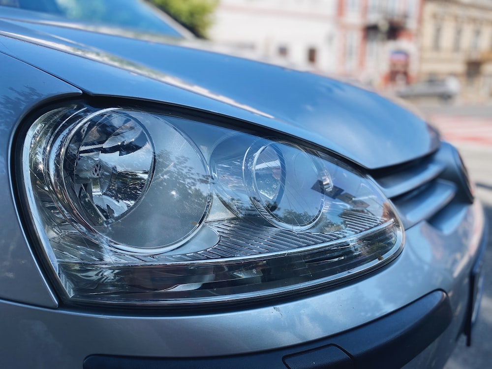 a close up of the headlights of a car