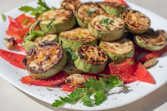 a white plate topped with lots of veggies