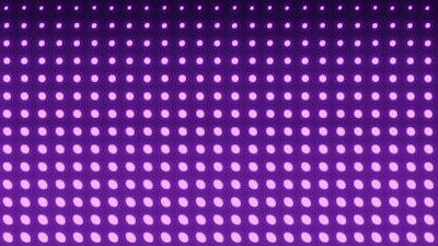 Glowing cloud icon surrounded by a grid of secure data points under a purple and blue neon glow.