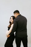 a man and a woman standing next to each other