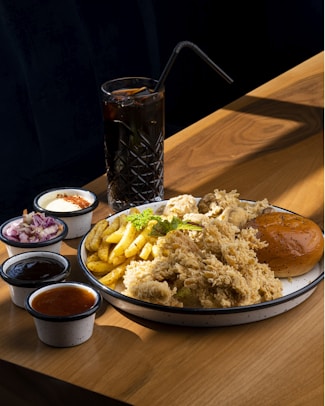 a plate of food on a wooden table