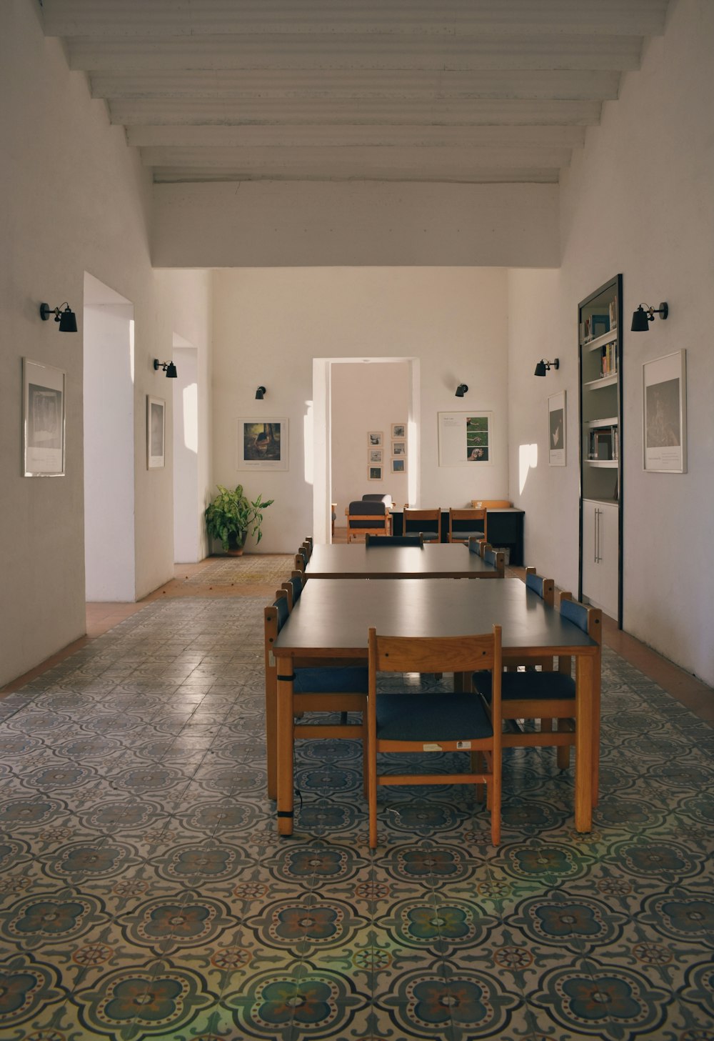 a dining room with a table and chairs