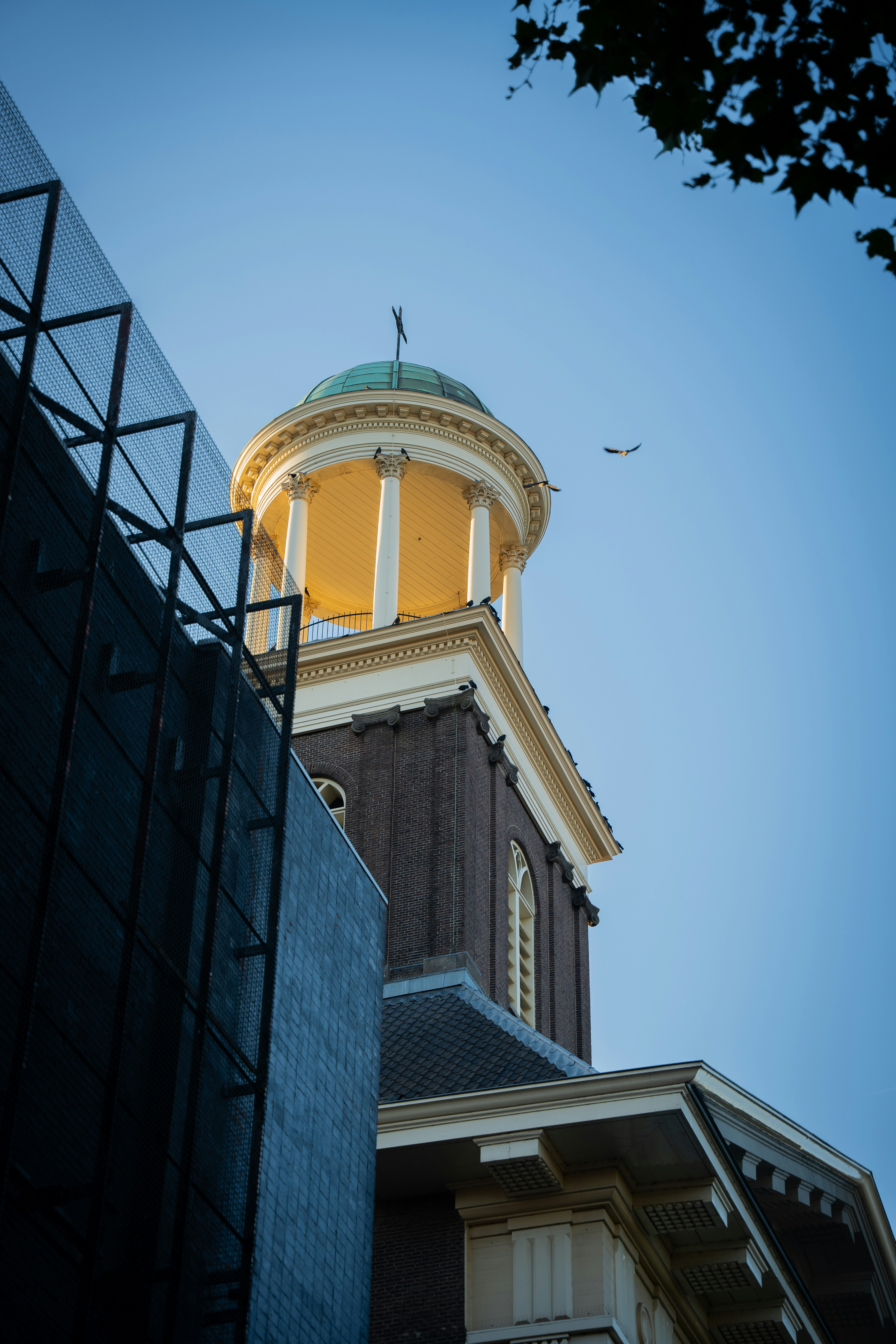 a tall tower with a clock on top of it