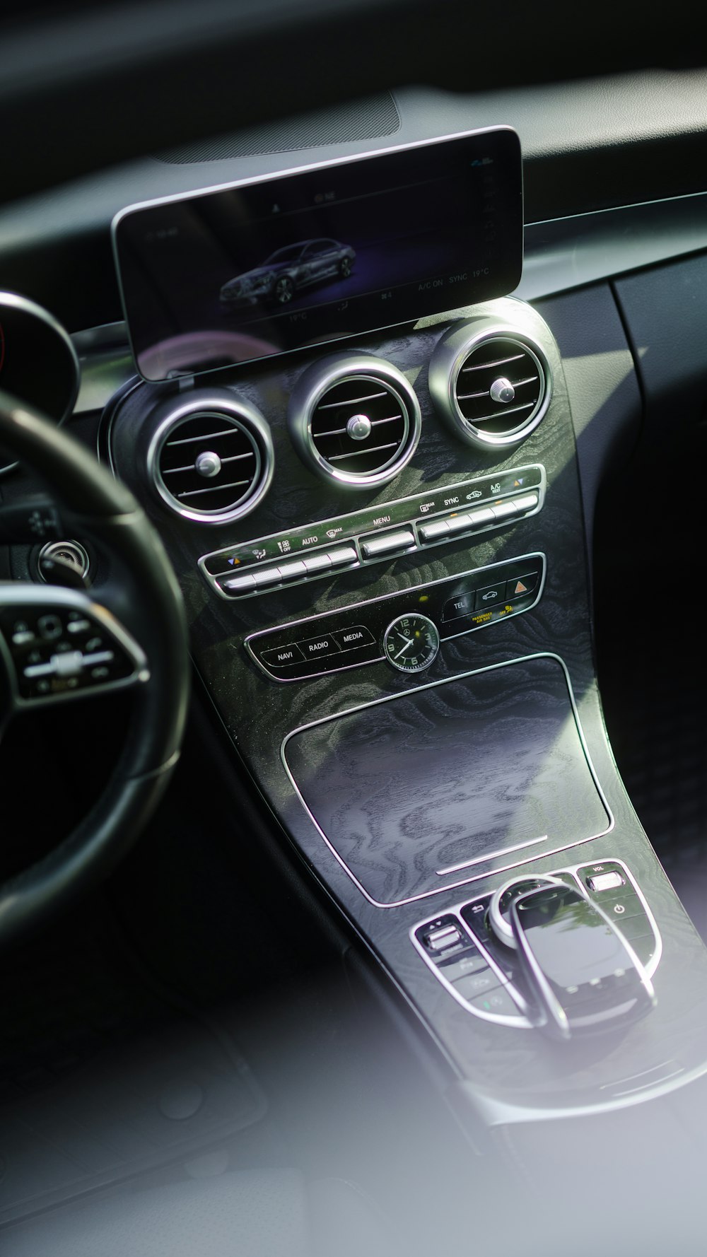 the dashboard of a car with a digital display