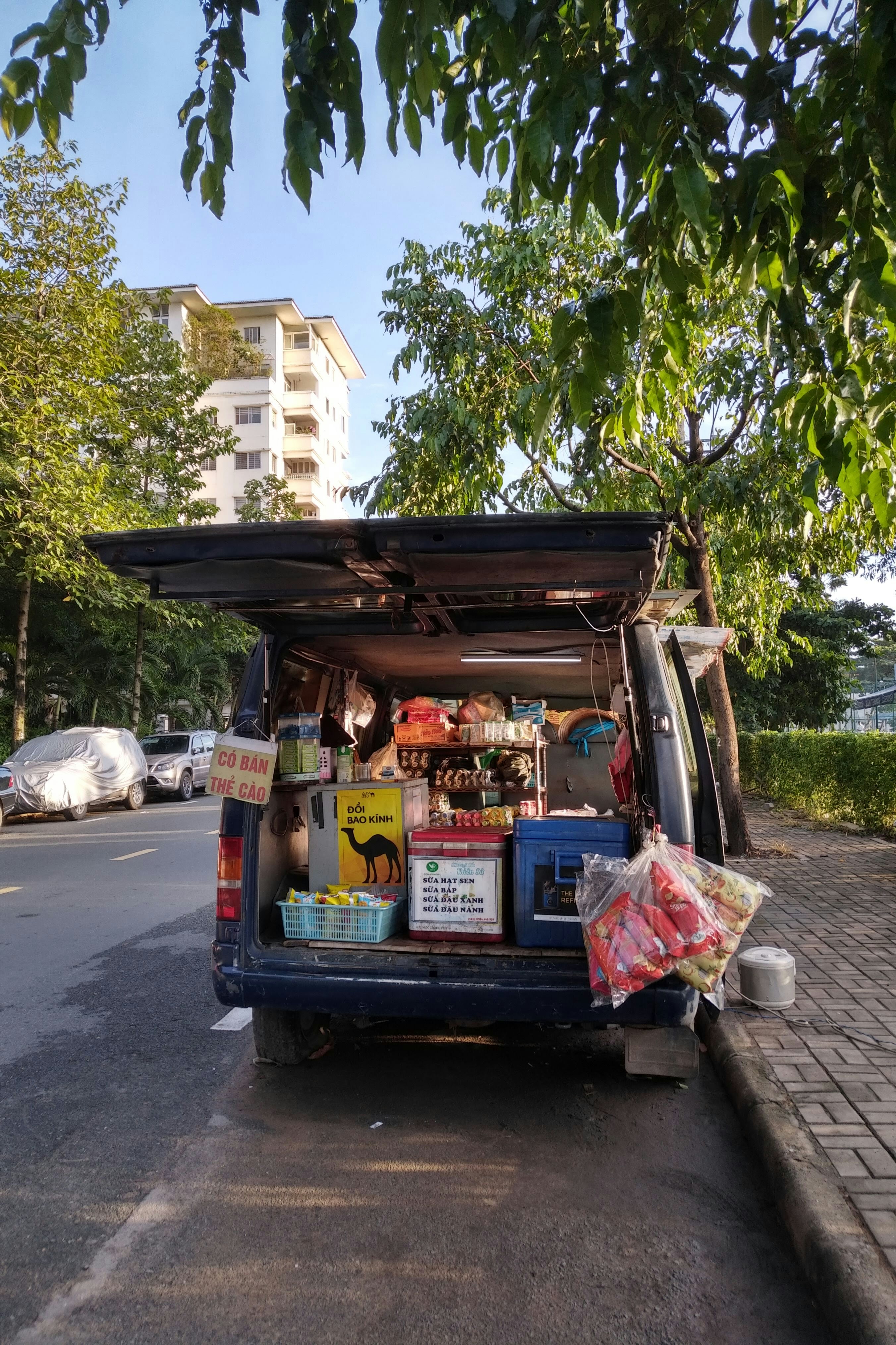 a van is parked on the side of the road