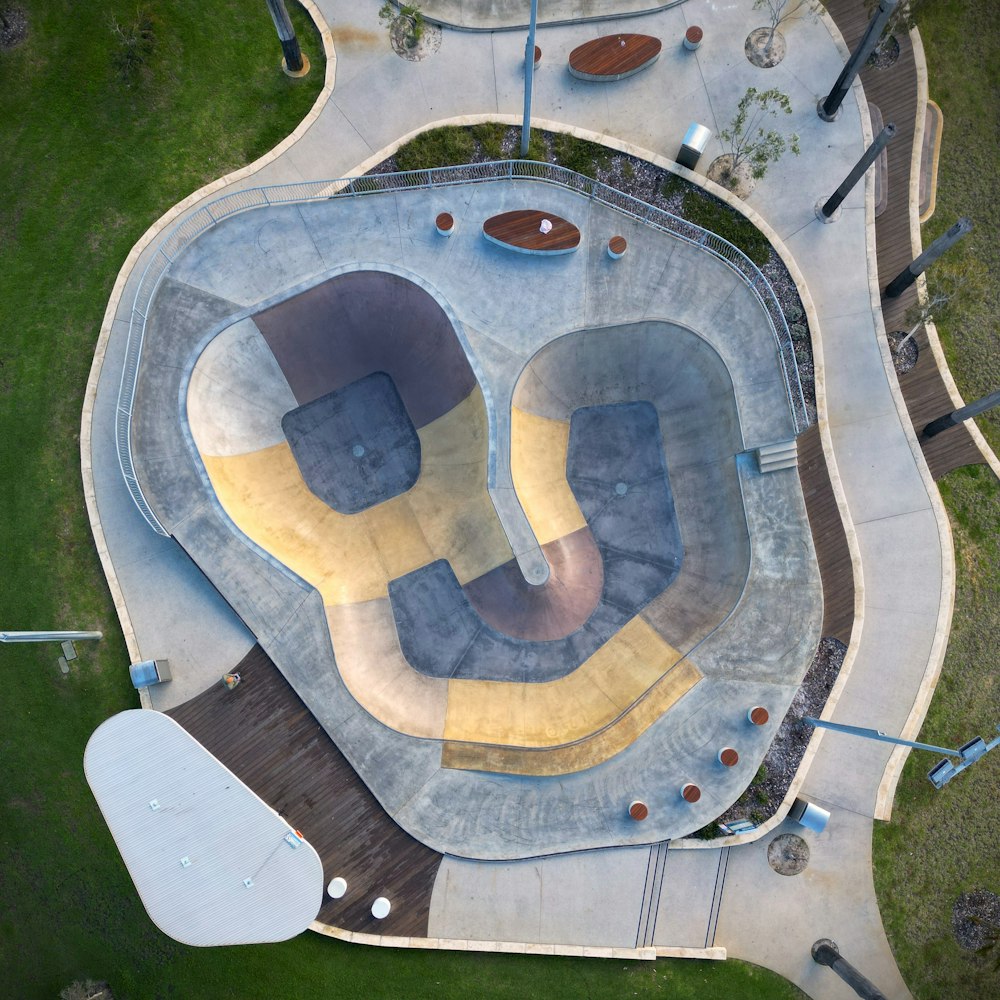 an aerial view of a skate park with ramps and ramps