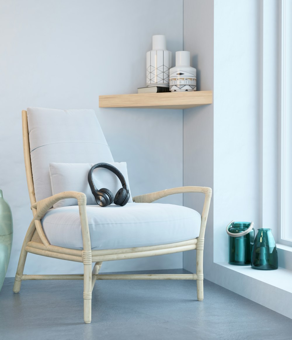 a chair with headphones on it in a room