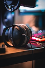 a pair of headphones sitting on top of a desk