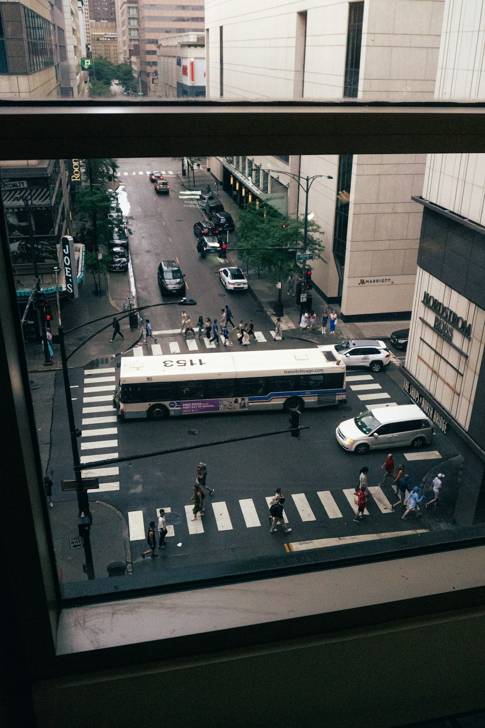 a view of a city street from a window