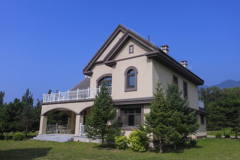 a large house with a balcony and a balcony