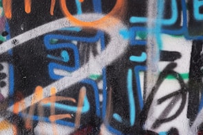 A colorful graffiti piece showcasing abstract designs.