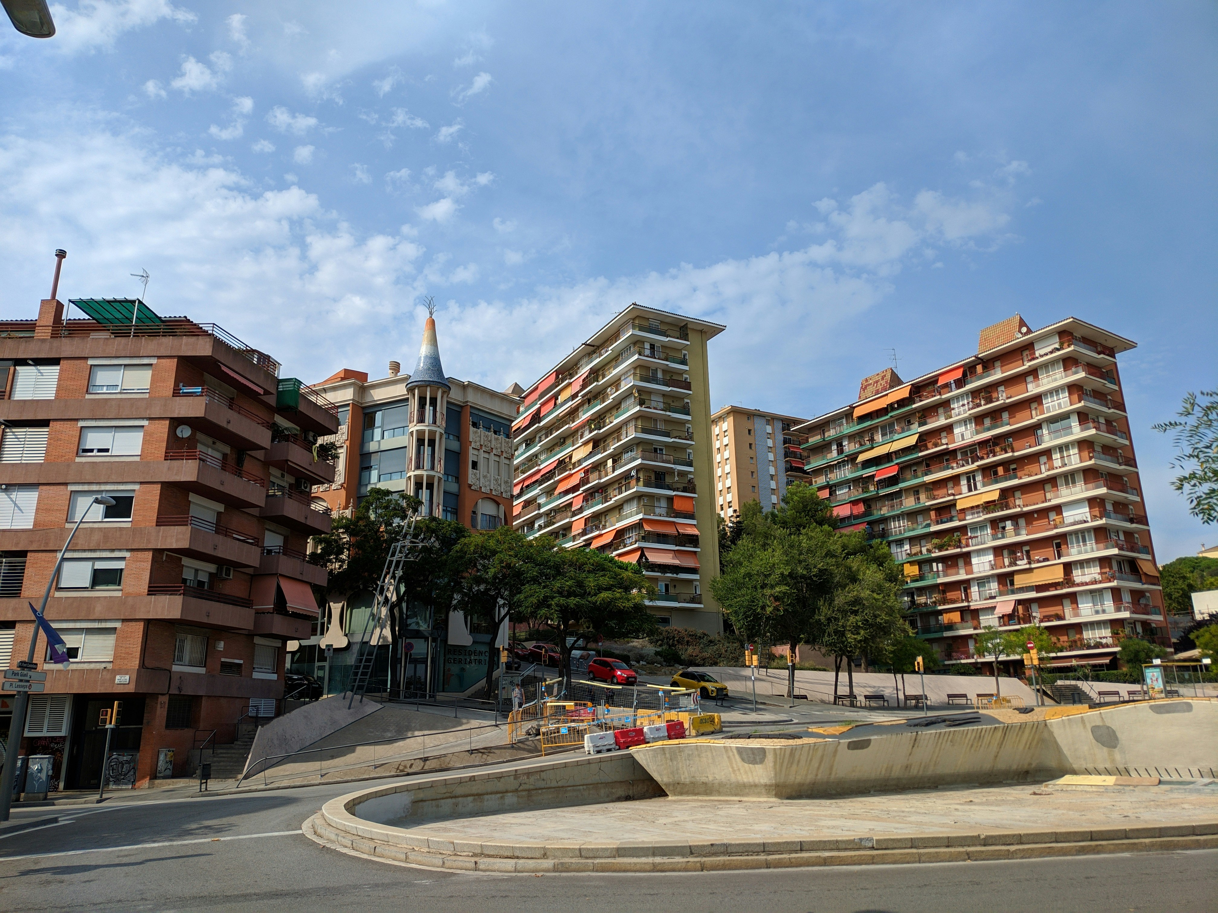 a view of some buildings from a street corner