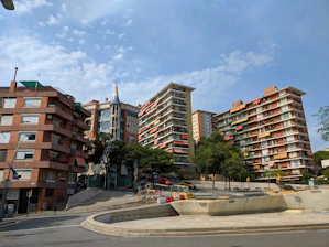 a view of some buildings from a street corner