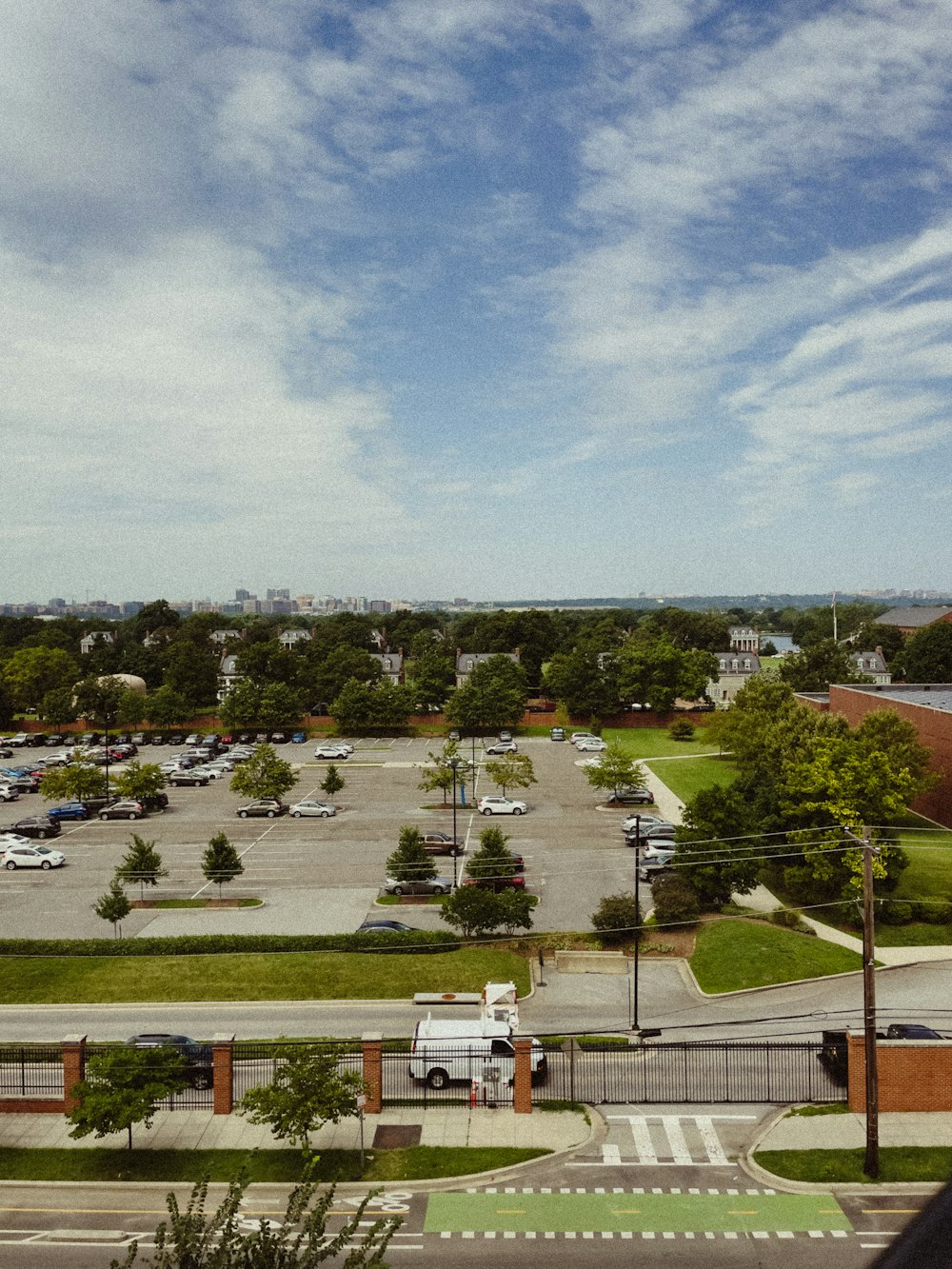 a view of a parking lot from a window