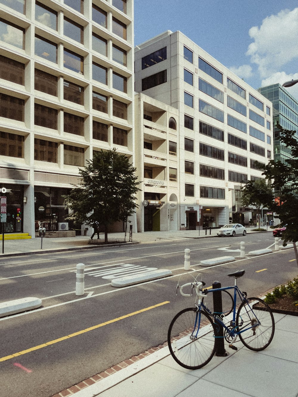 a bike parked on the side of the road