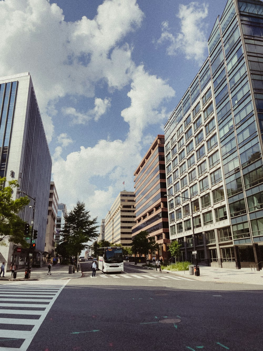 a city street filled with lots of tall buildings