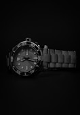 a watch is shown on a black background