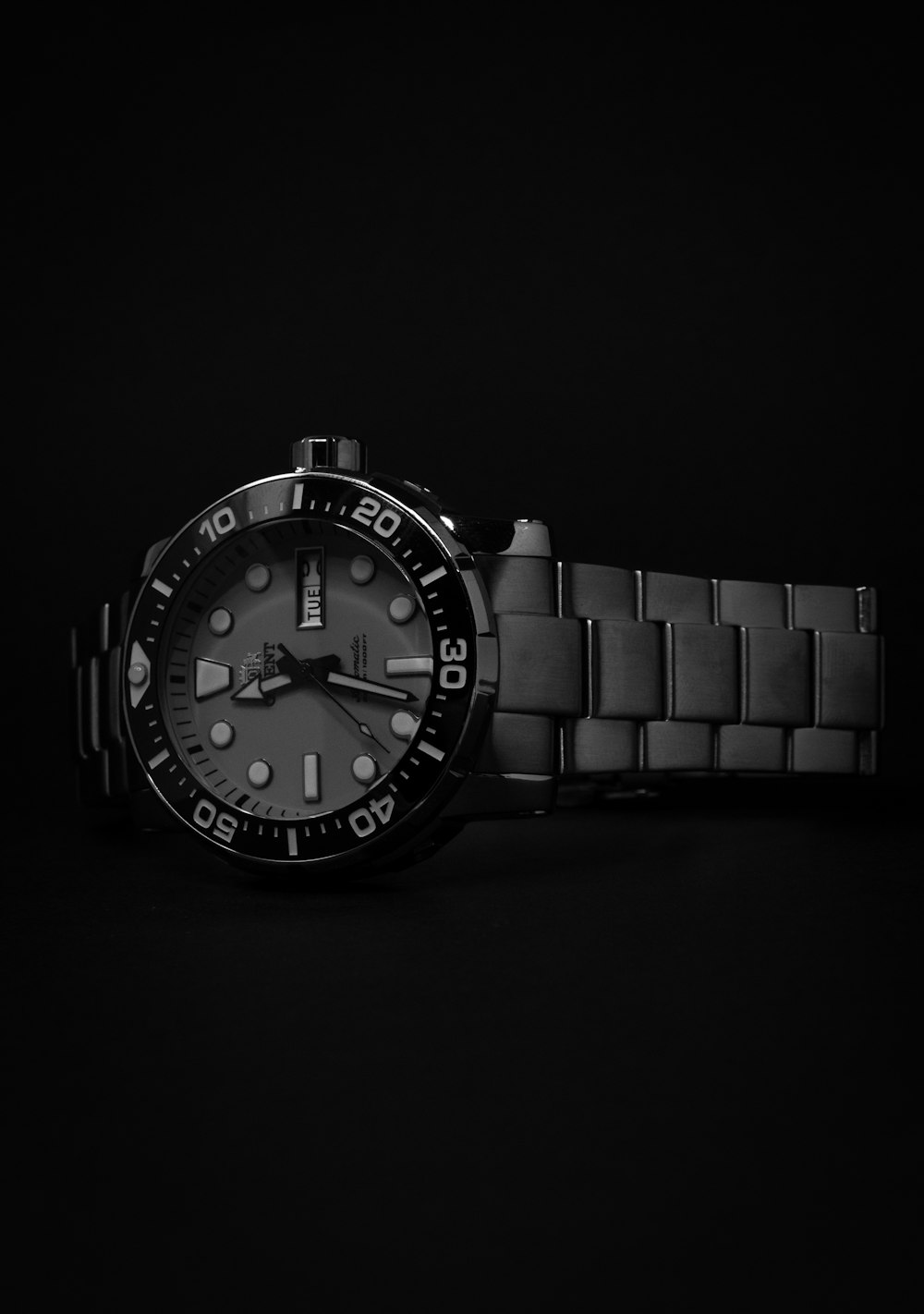 a watch is shown on a black background