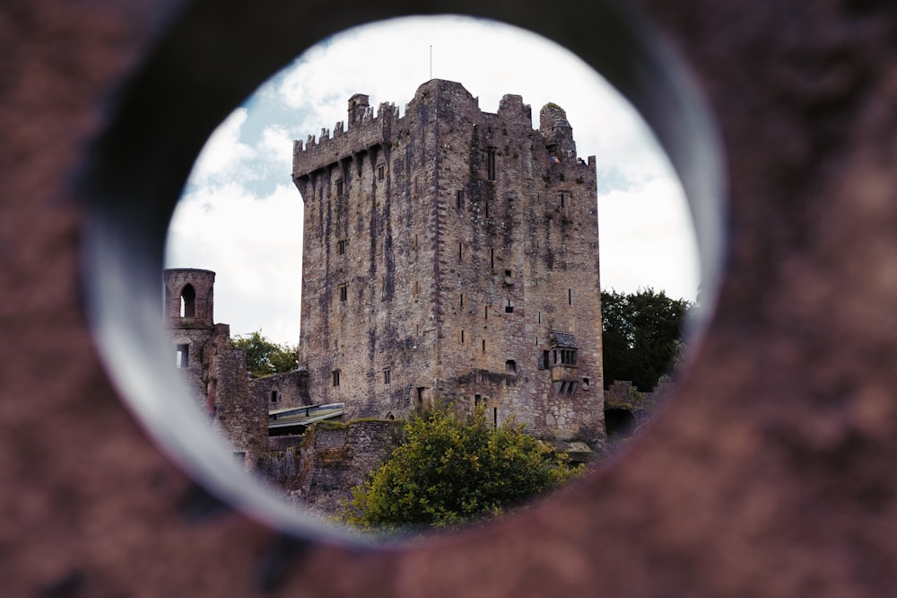 a view of a castle through a magnifying glass