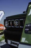 A Suzuki car being showcased at a local event.