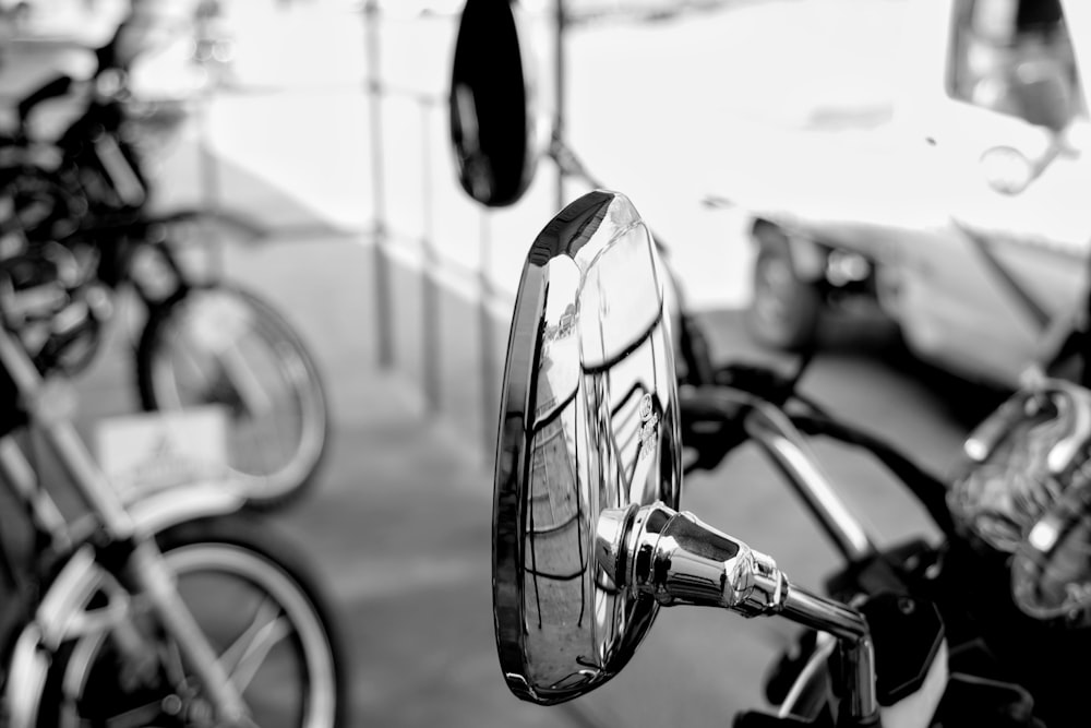 a close up of a mirror on a motorcycle