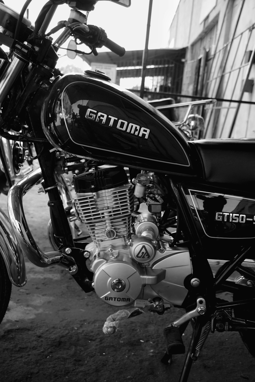 a black and white photo of a motorcycle