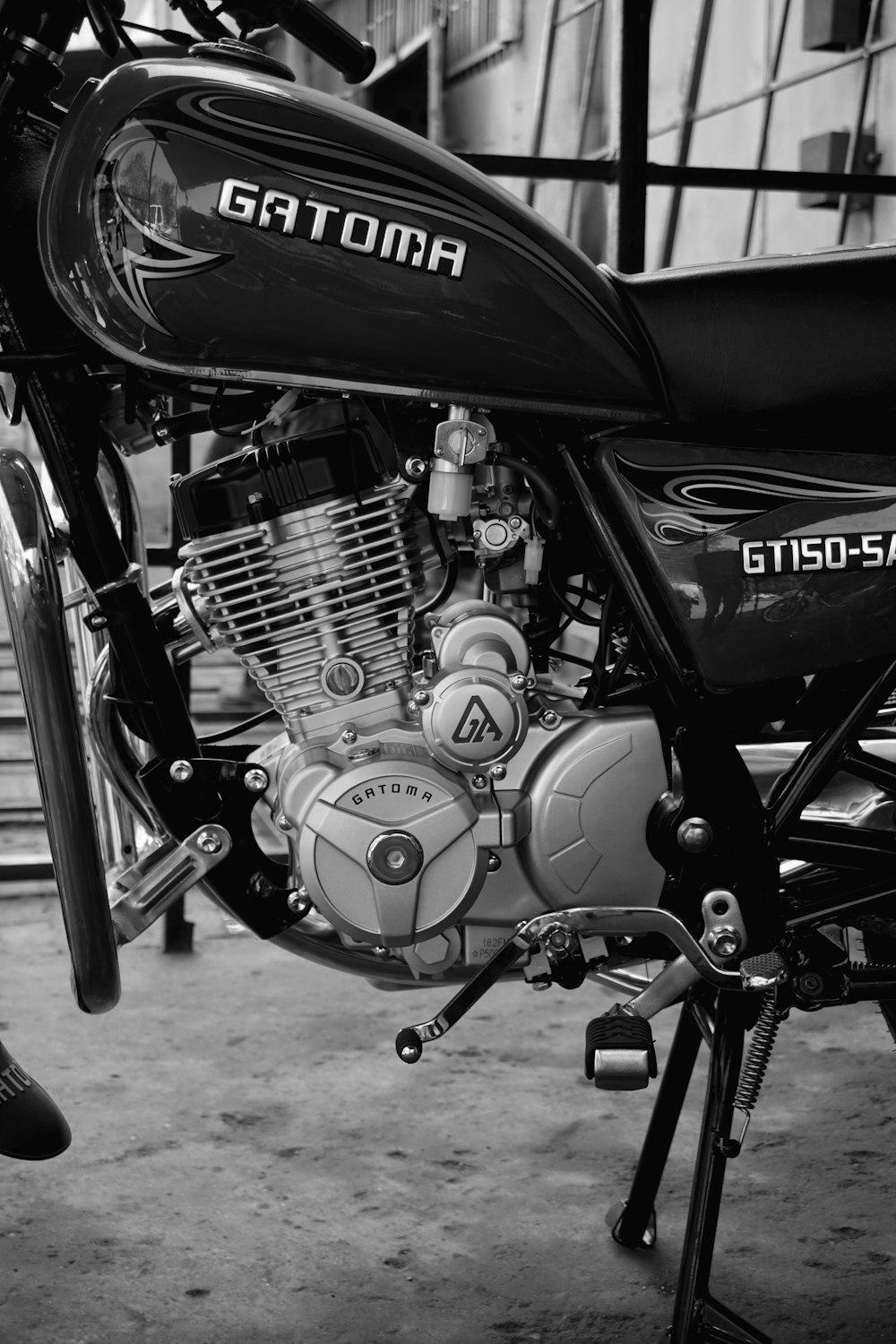 a black and white photo of a motorcycle