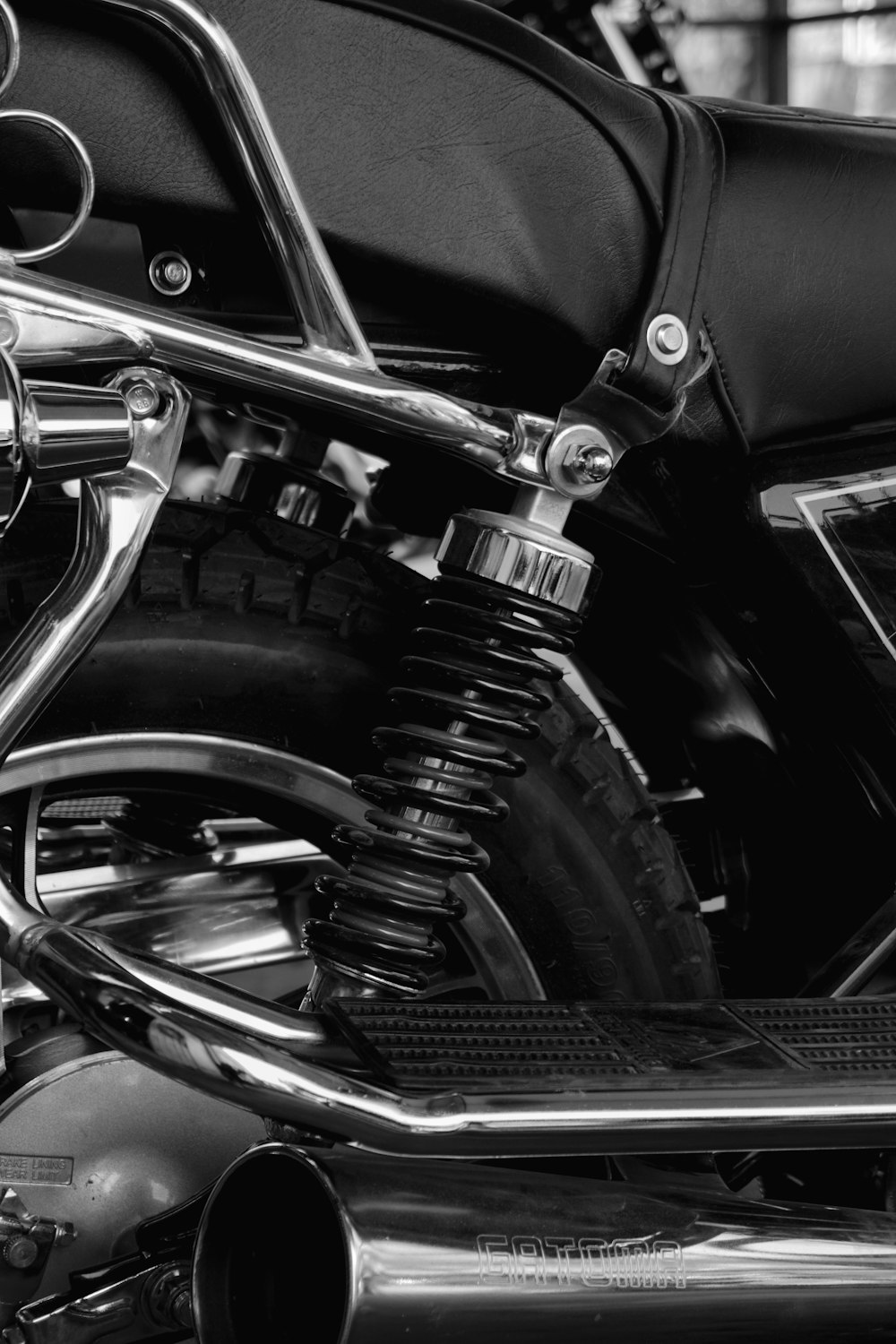 a black and white photo of a motorcycle