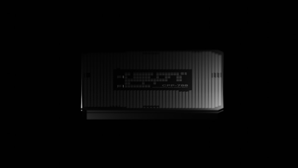 a black and white photo of a black box