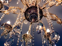 a fancy chandelier hanging from the ceiling