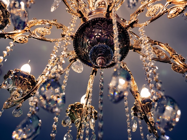 a fancy chandelier hanging from the ceiling