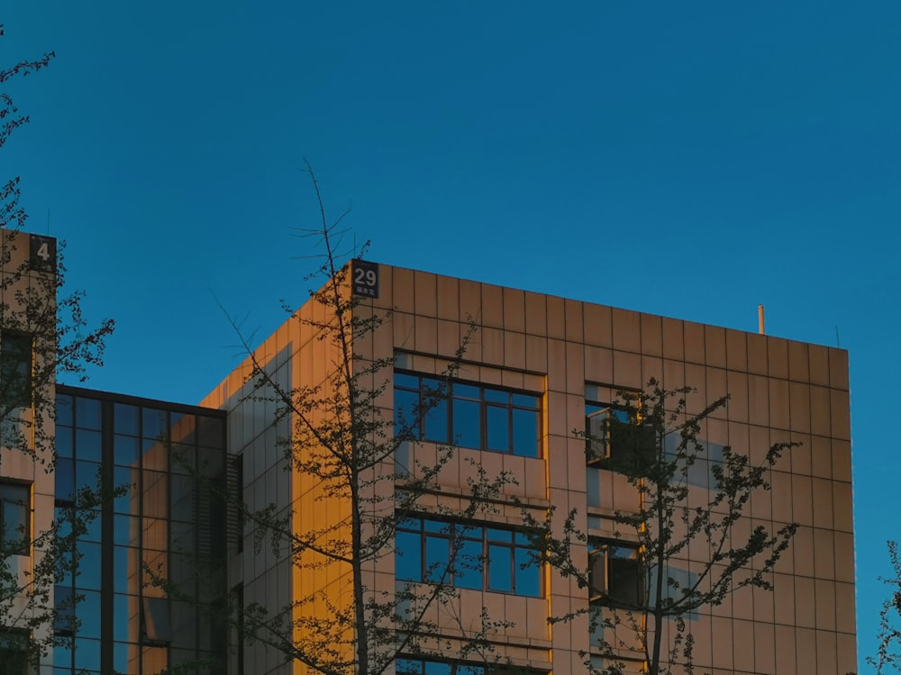 a tall building with a clock on the side of it