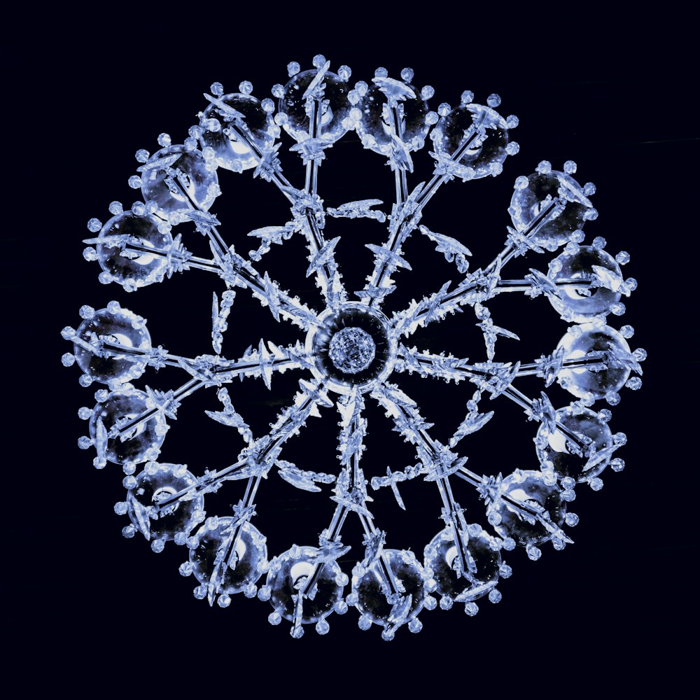 a snowflake is shown on a black background