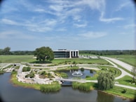 A wide shot of the institute's peaceful exterior surrounded by lush greenery.