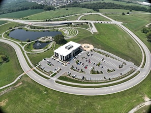 Wide-angle view of the well-lit parking lot and entrance, showcasing the venue’s accessibility and security.