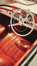 Close-up of a detailed restomod car interior blending retro and modern design elements.
