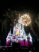 Children laughing and playing inside the enchanted castle with colorful fairy lights.