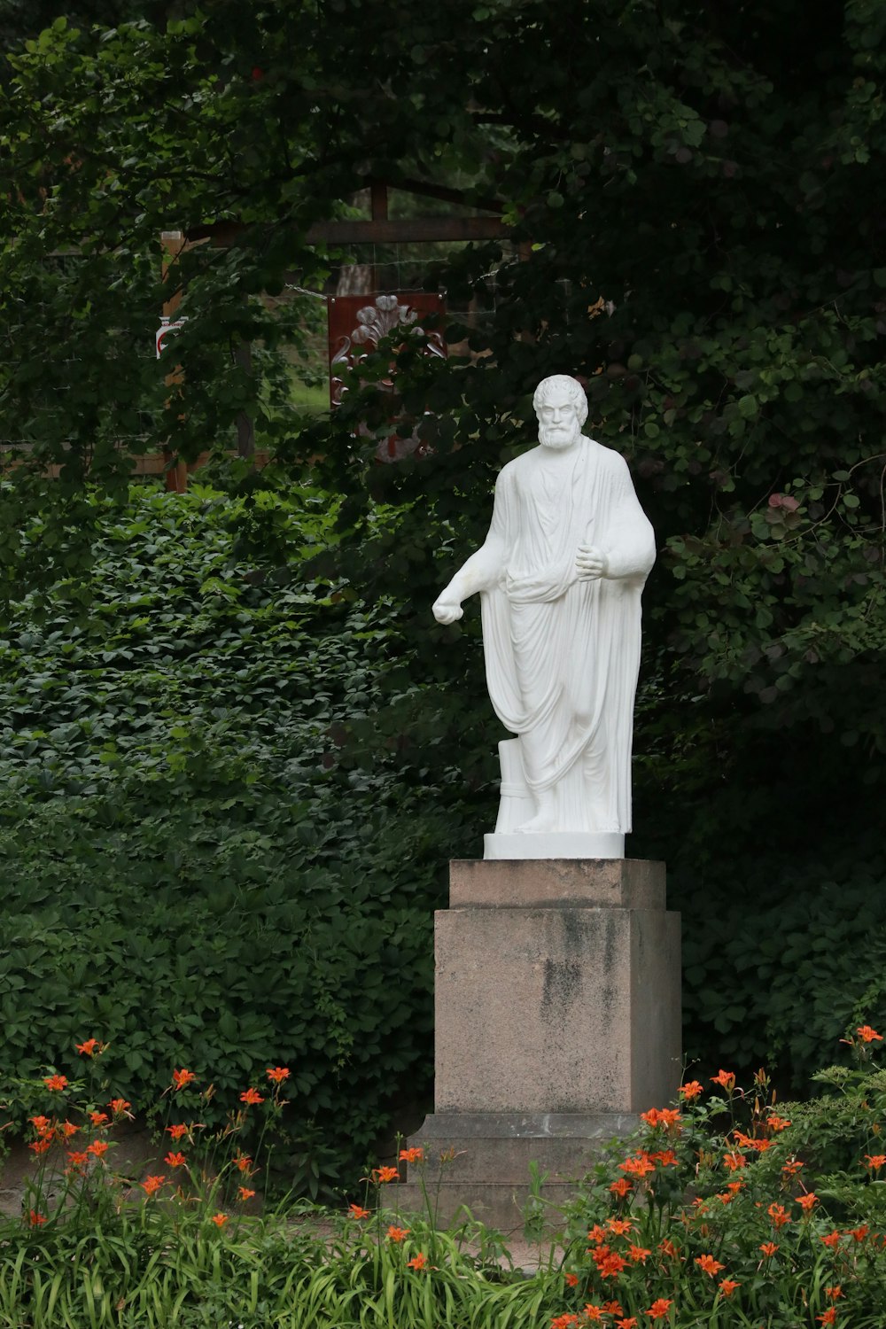 a statue of a person with a robe on
