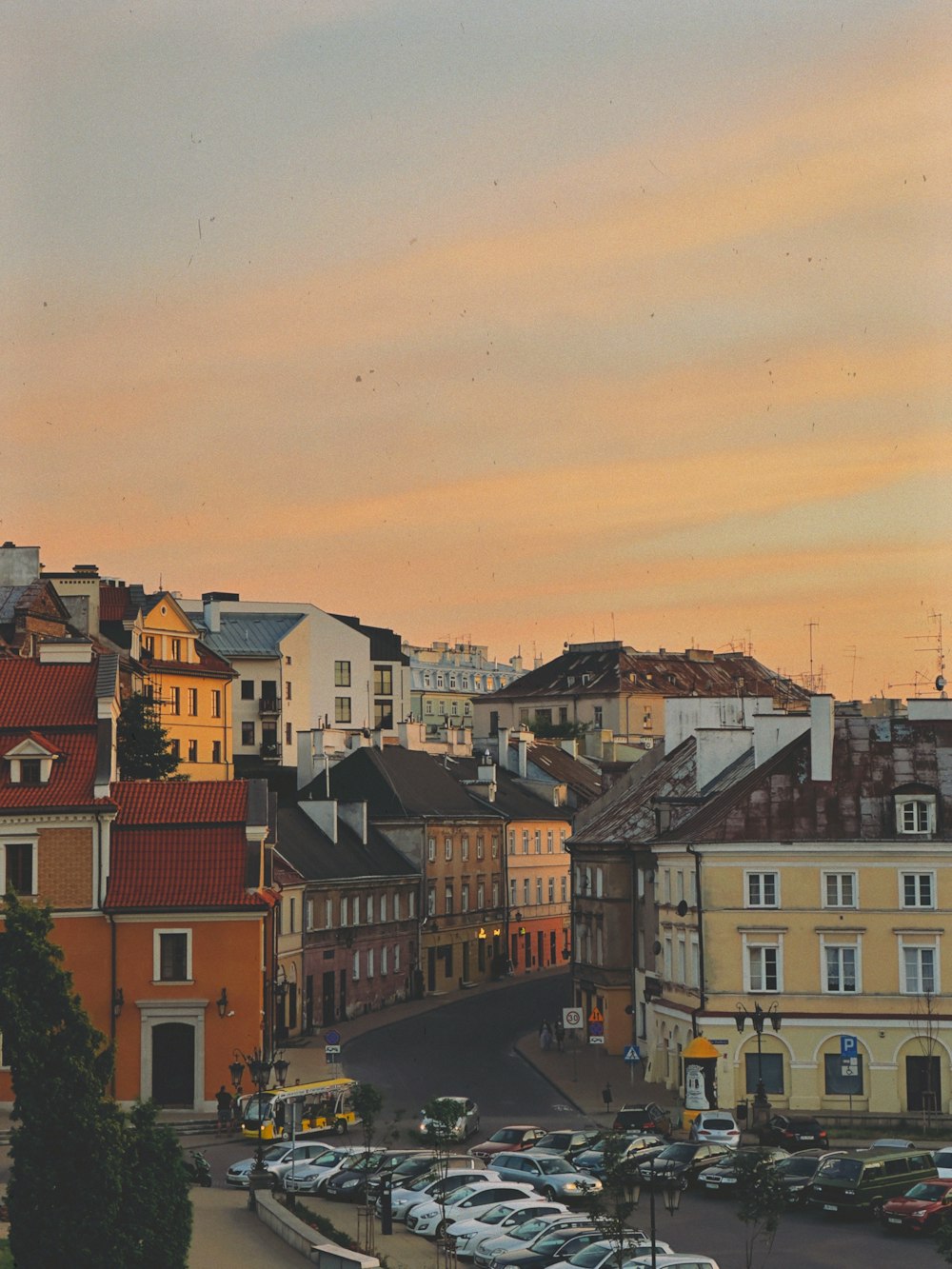 a view of a city from a hill