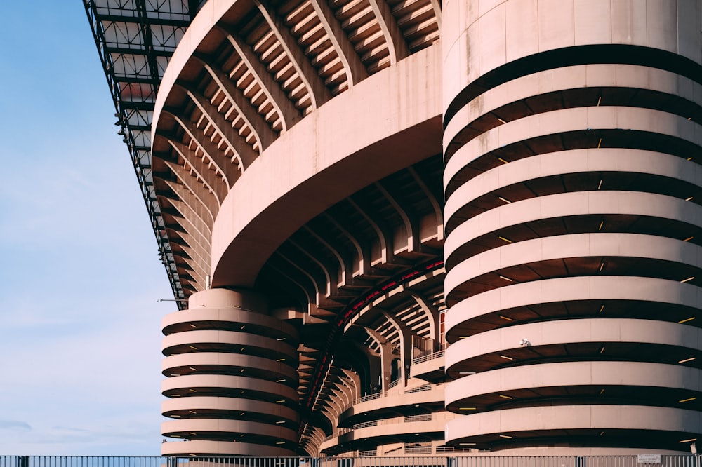 a tall building with a spiral design on the side of it