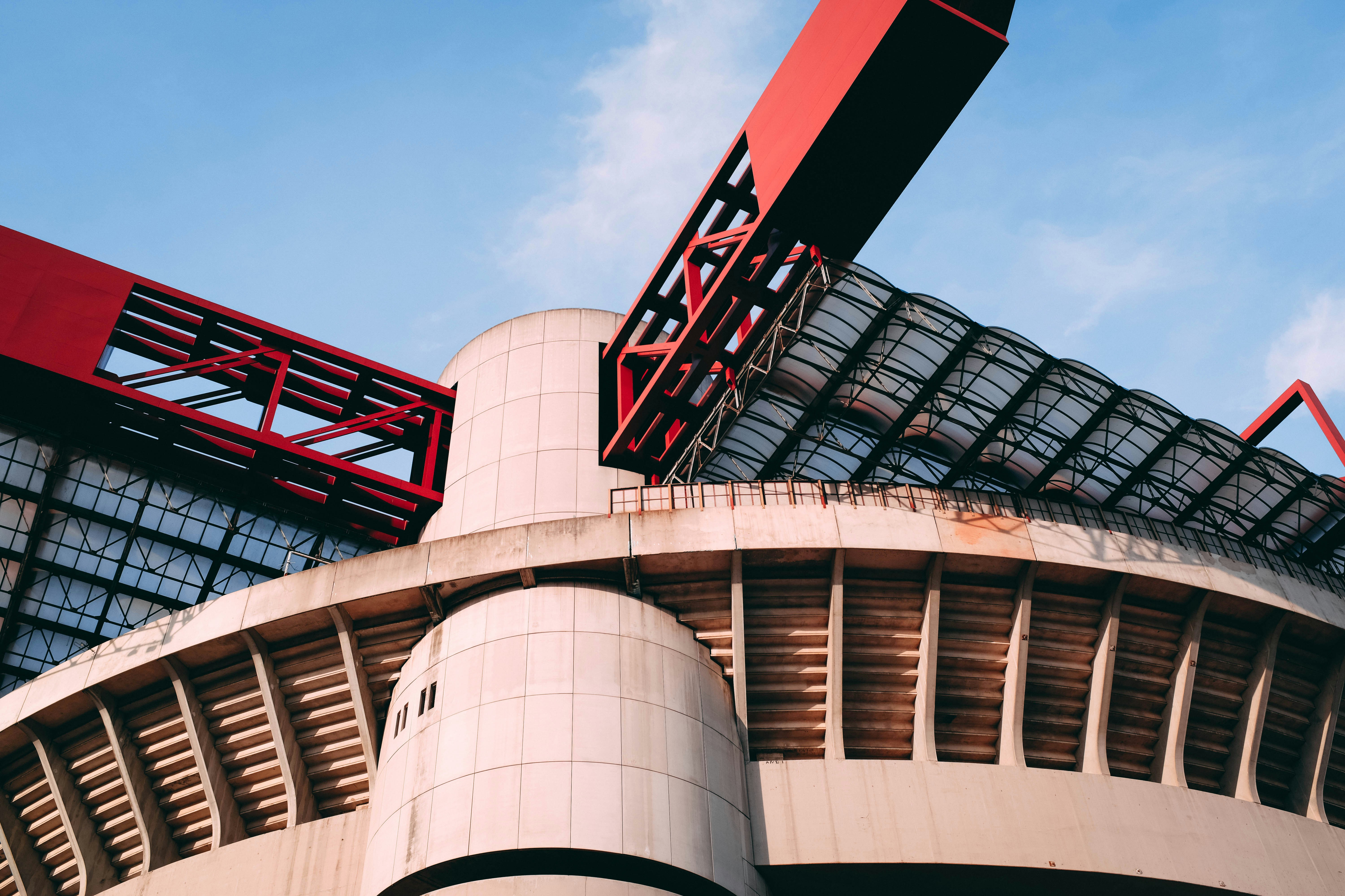 a large building with a large red object on top of it