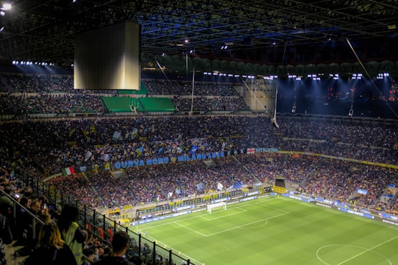 a stadium full of people watching a soccer game