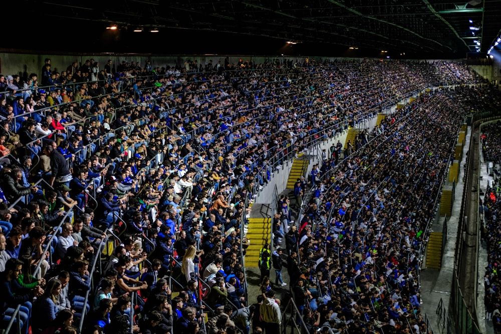 a large crowd of people in a stadium