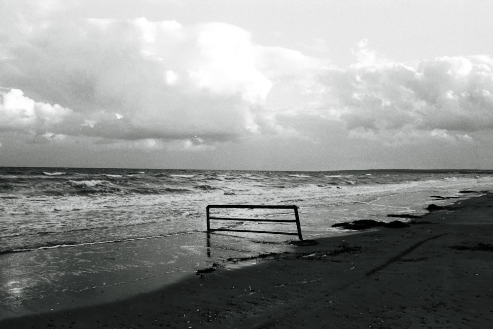 a black and white photo of a beach